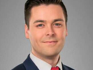 Joshua Cole, an anchor and reporter